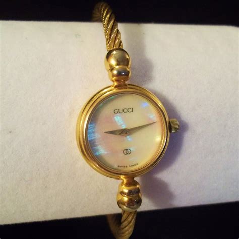 vintage gold gucci bangle watch how to change battery|vintage Gucci watch 1980s.